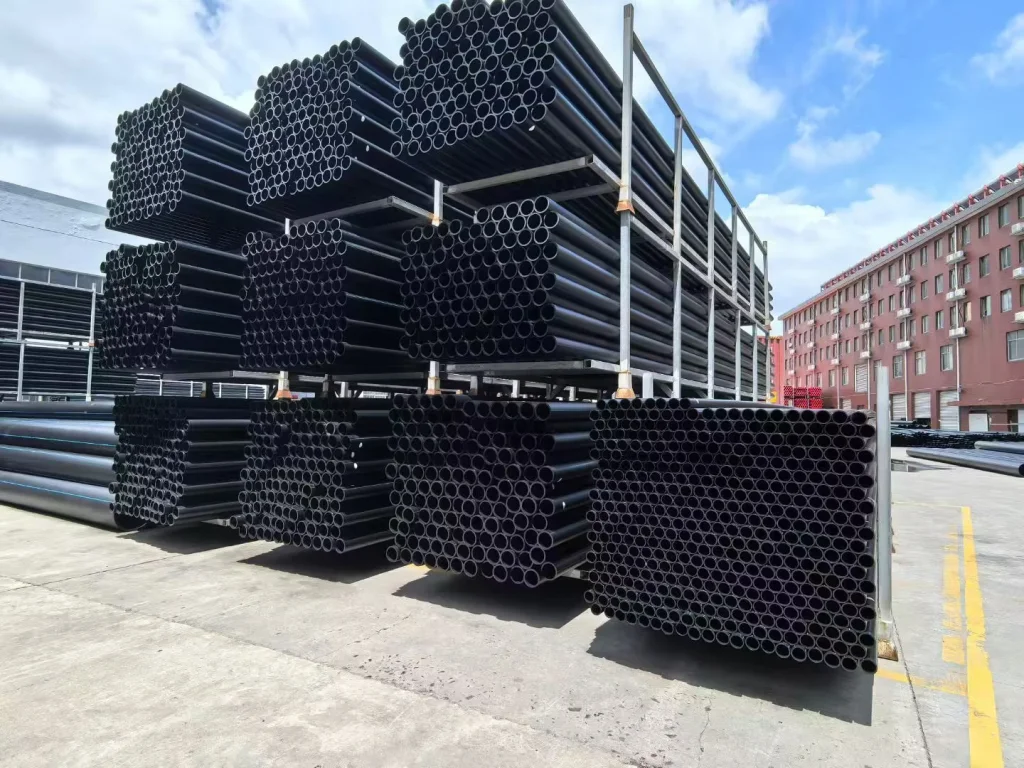 stock image of black plastic piping